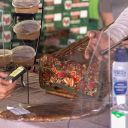 Customer paying with phone for packaged food at the market