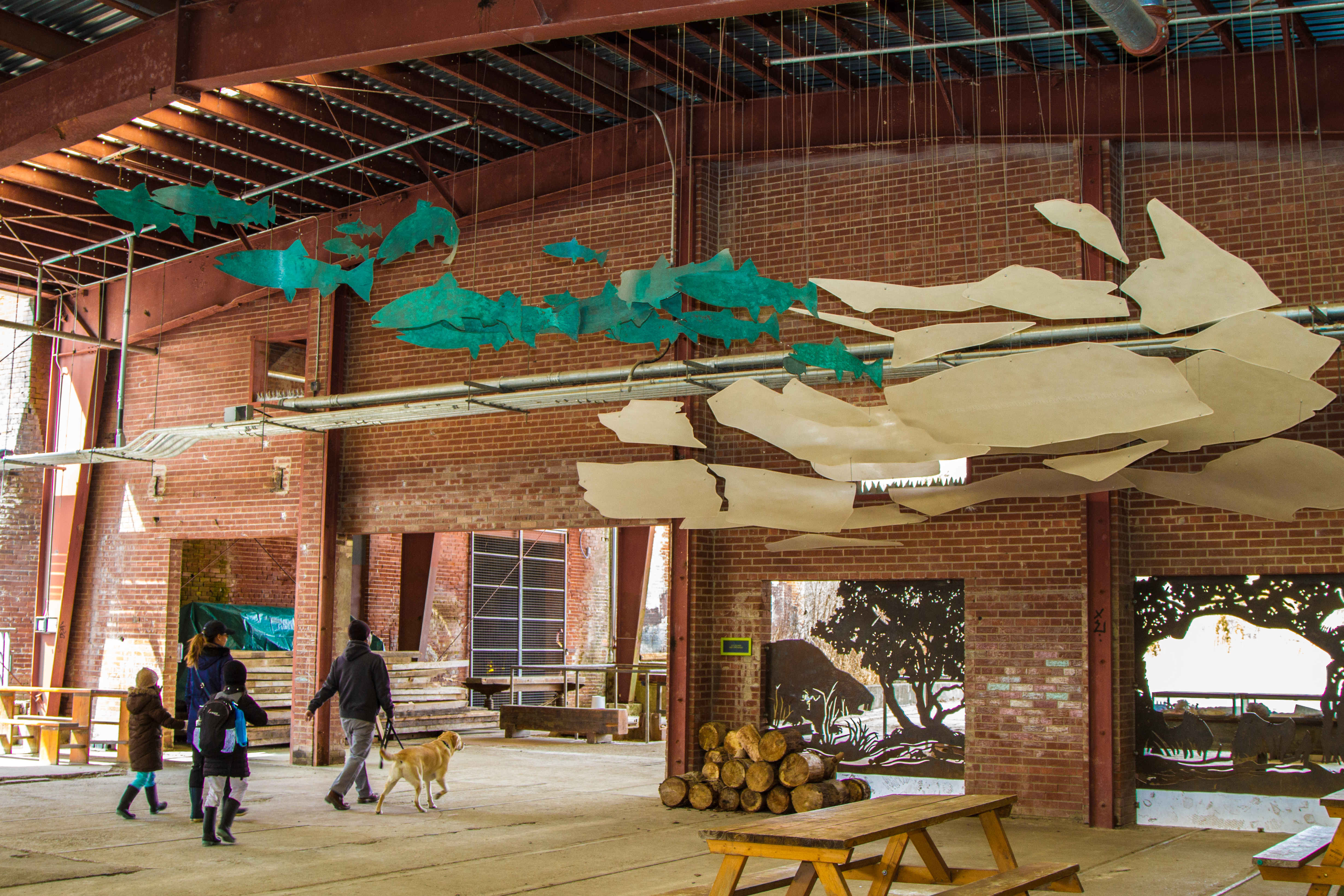 Pieces of sculptural material hang from the Brick Works ceiling