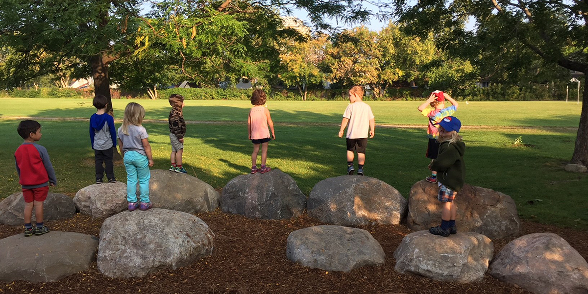 Evergreen 5 ways to invest in school grounds that improves outdoor play and learning kids on rocks