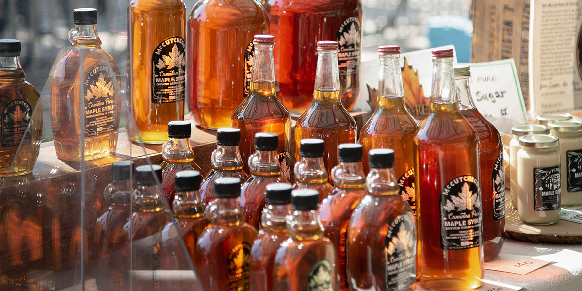 Bottles of McCutcheon's Maple Syrup at Evergreen Brick Works Farmers Market.