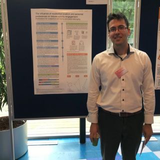 Person standing in front of a chart