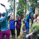 Volunteers cheering at a City Park Stewards event in North Vancouver