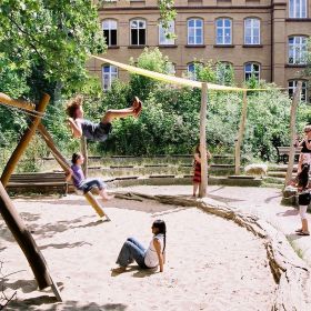 Children playing in an outdoor school ground