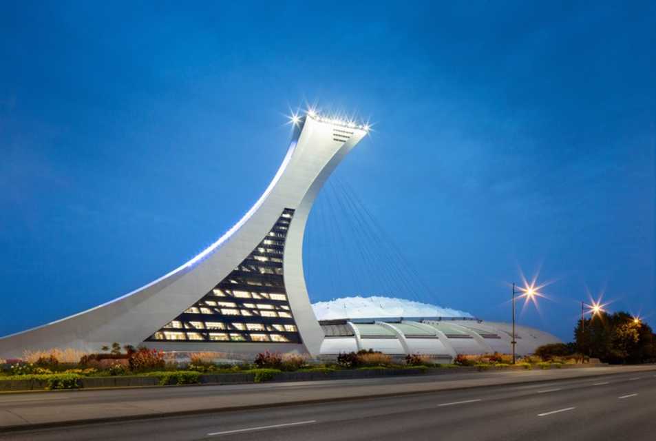stadium building that now resembles an office building under blue sky at dusk